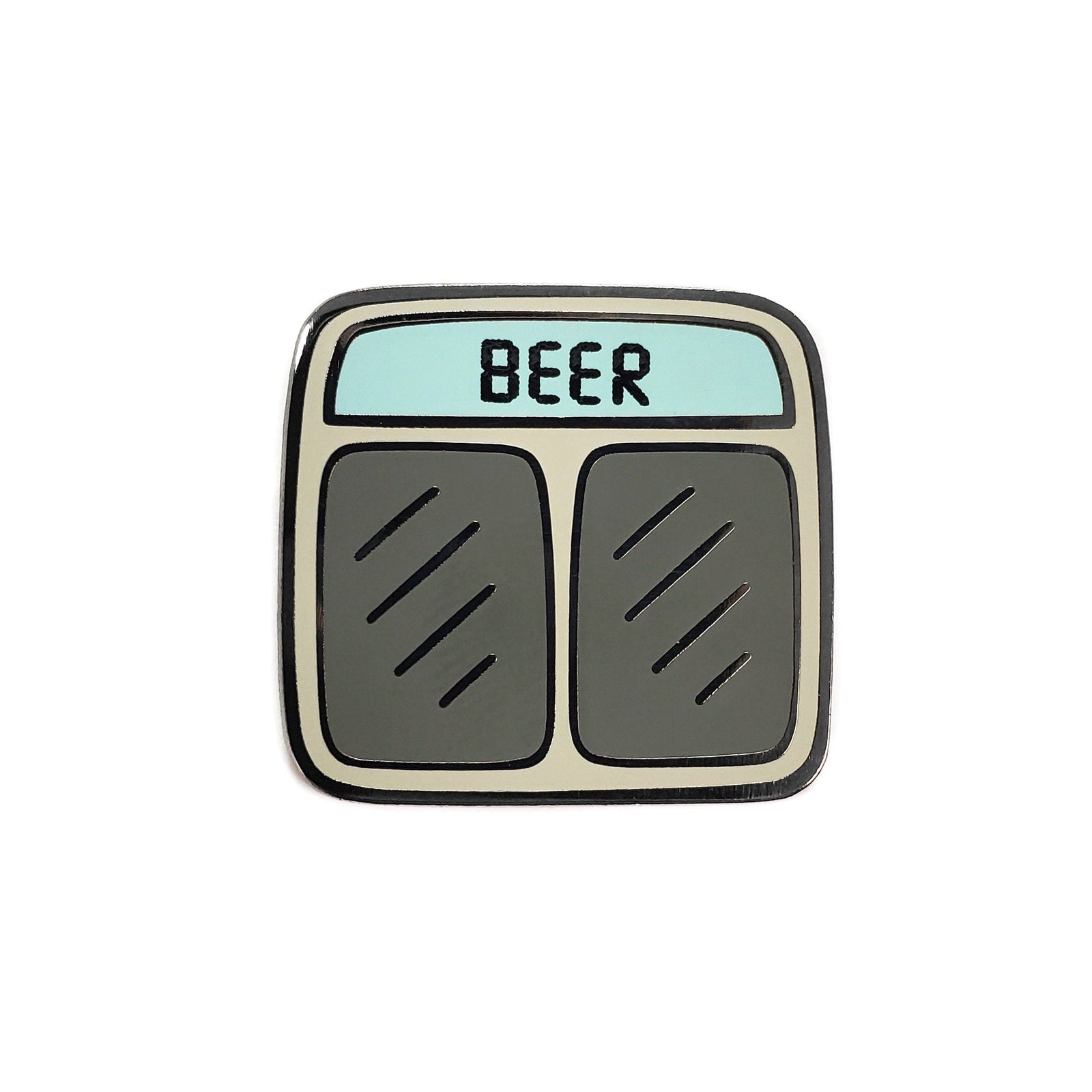 Kolorspun Beer Scale golf ball marker with colorful design, shown on a golf course, used for marking golf balls during play.
