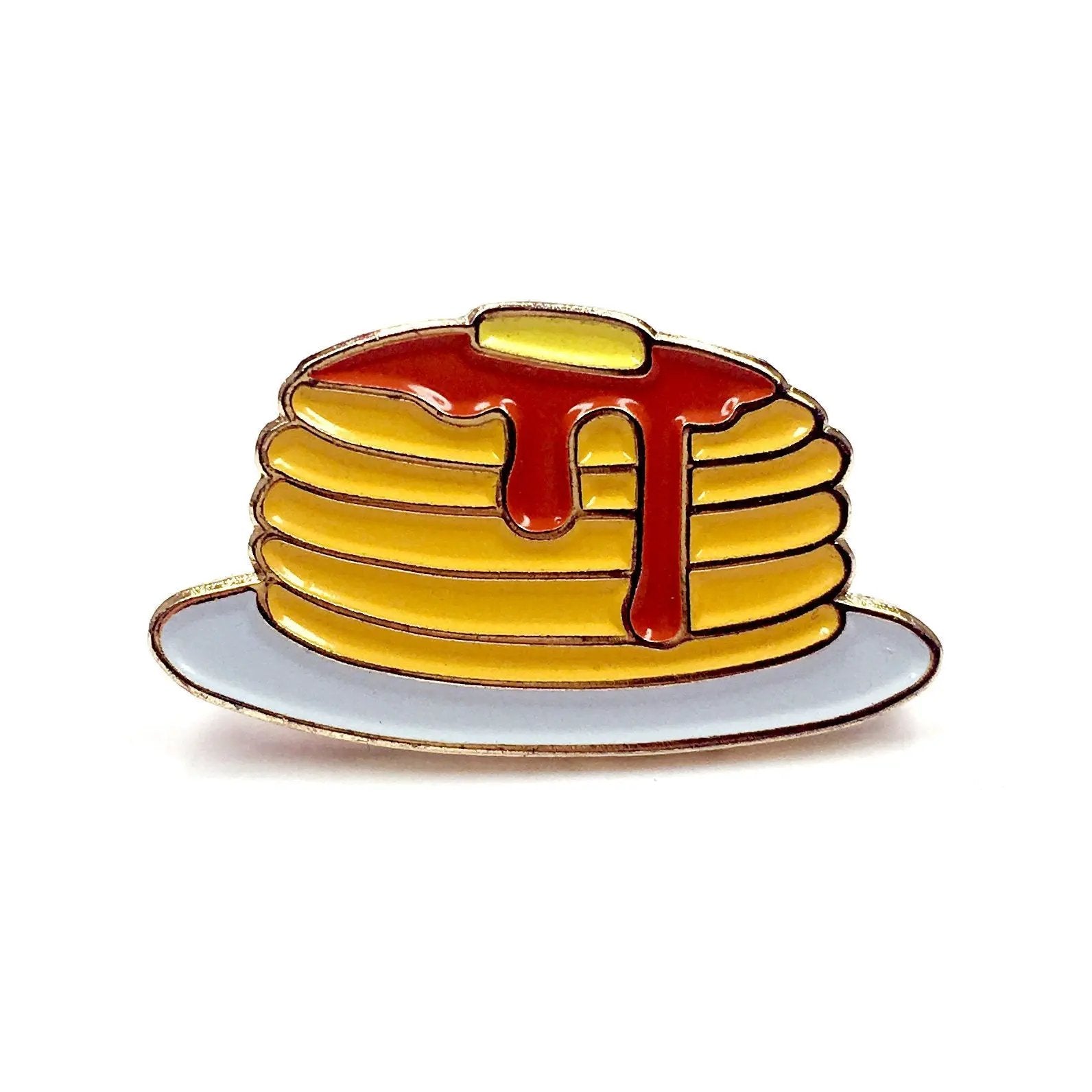 Kolorspun Pancakes golf ball marker featuring a colorful pancake design, used for marking golf balls on the green.