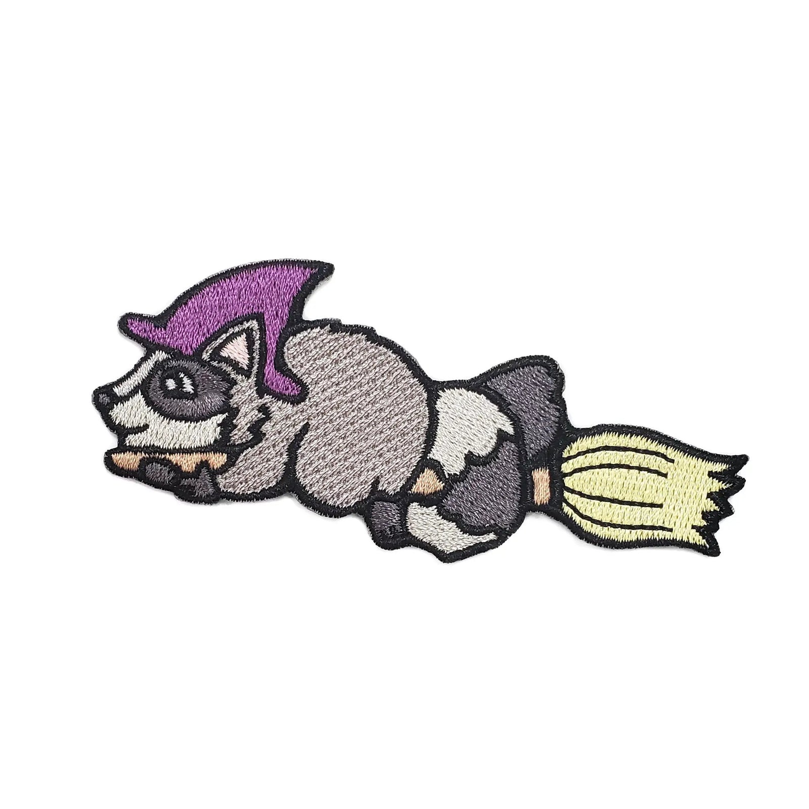 Kolorspun Raccoon Witch patch featuring a whimsical raccoon wearing a witch hat, sewn badge for clothing or accessories.