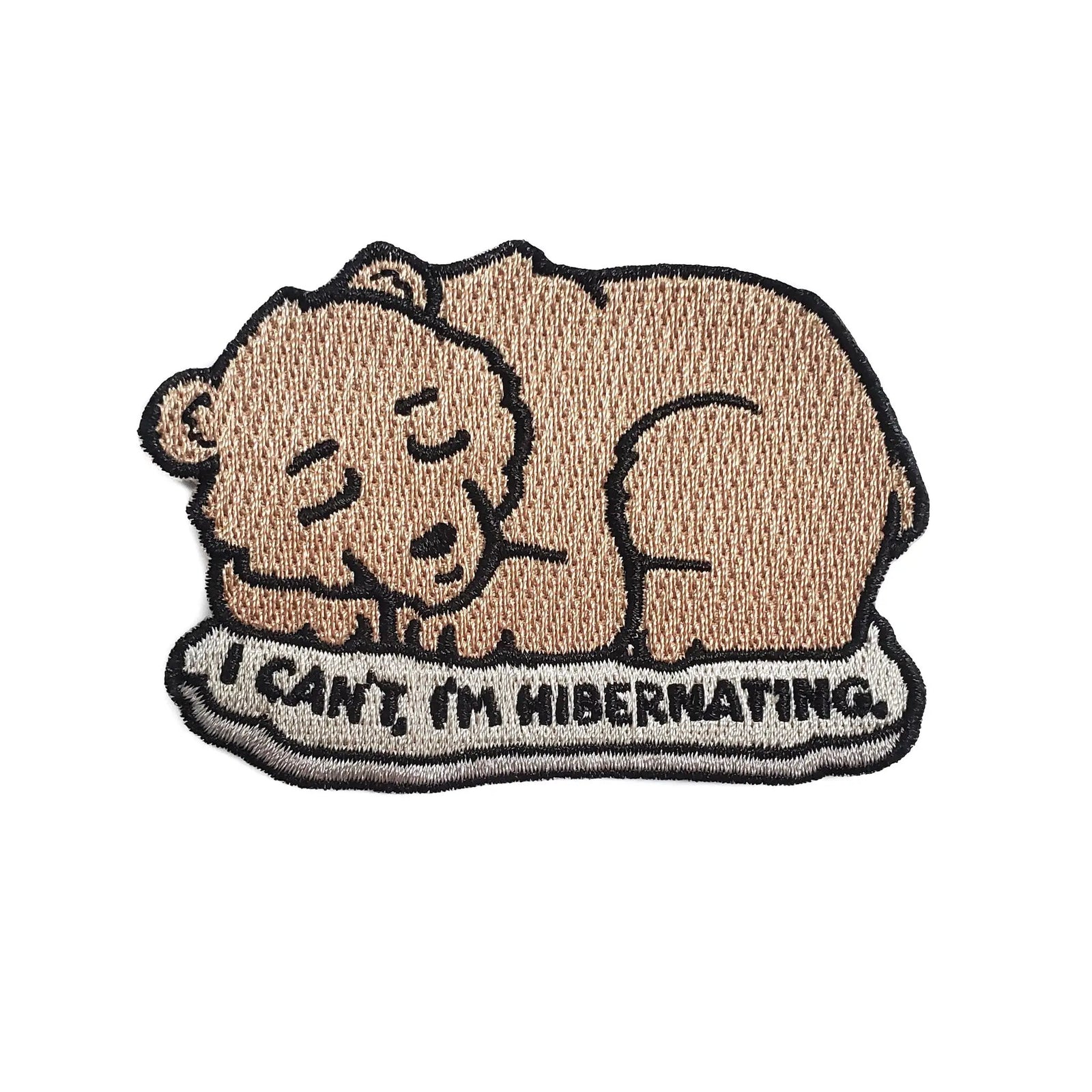 Kolorspun hibernating bear patch showing a cute bear illustration sewn onto a fabric patch.