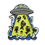Kolorspun Glowing UFO cat golf ball marker showing a luminous UFO design on a golf course.