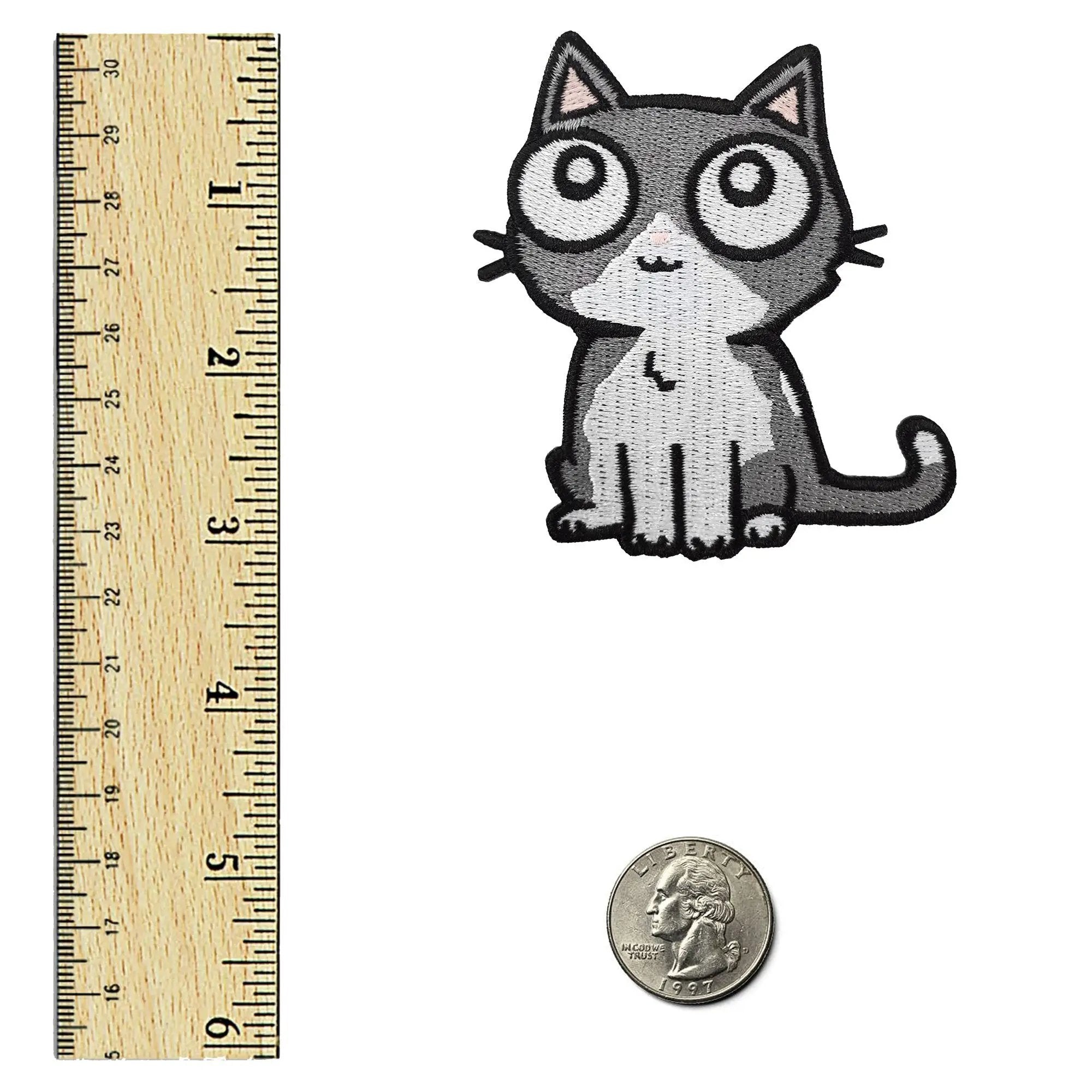 Gray cat patch by Kolorspun, featuring a detailed embroidered feline design on fabric background.