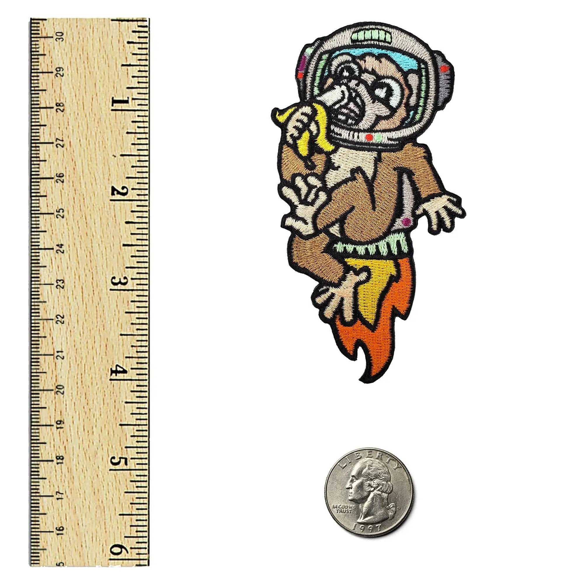 Kolorspun astronaut chimp patch featuring a detailed embroidered design of a chimp in a space suit on a fabric patch.