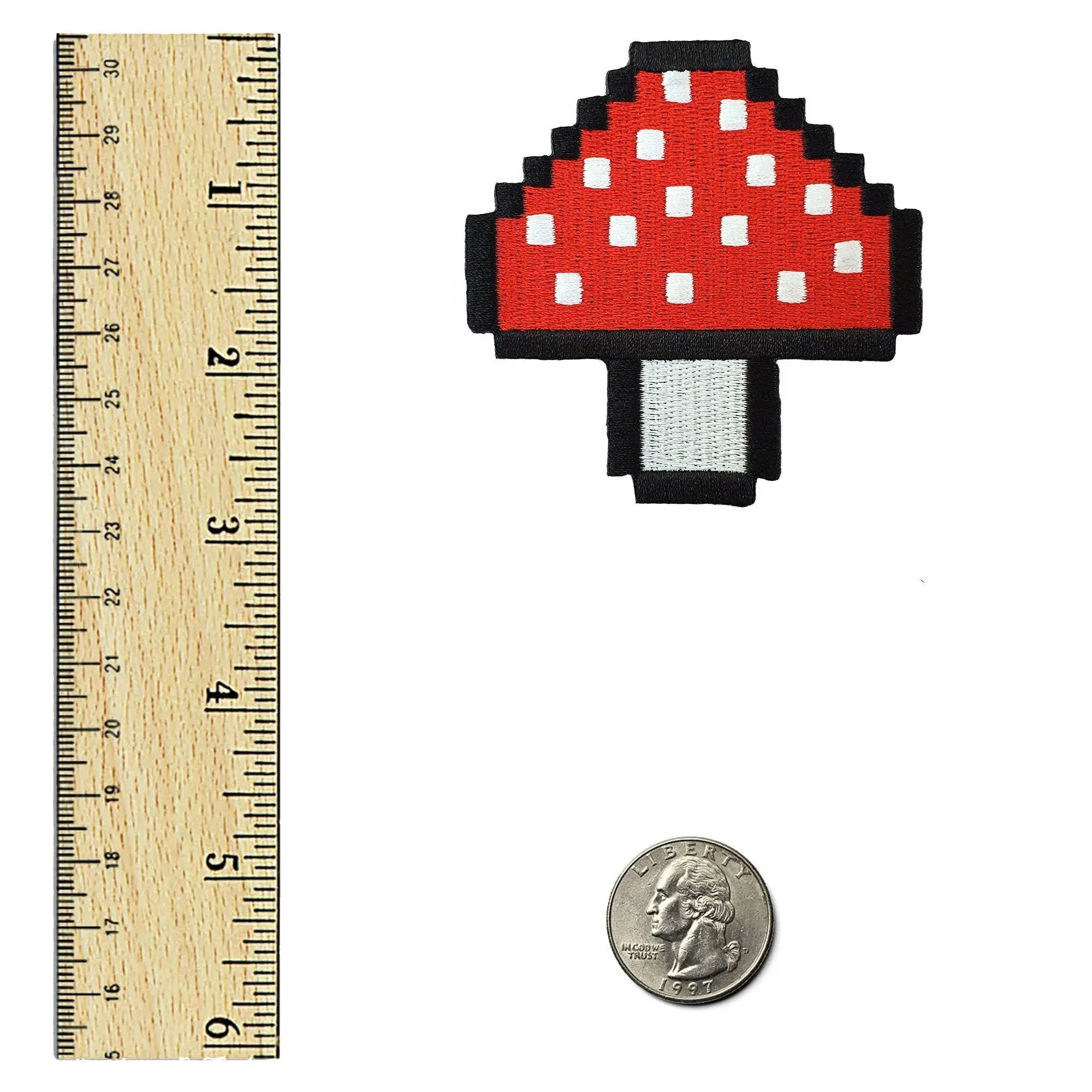 Kolorspun Pixel Mushroom Patch sewn onto fabric, featuring a colorful pixel-style mushroom design for clothing or accessories.
