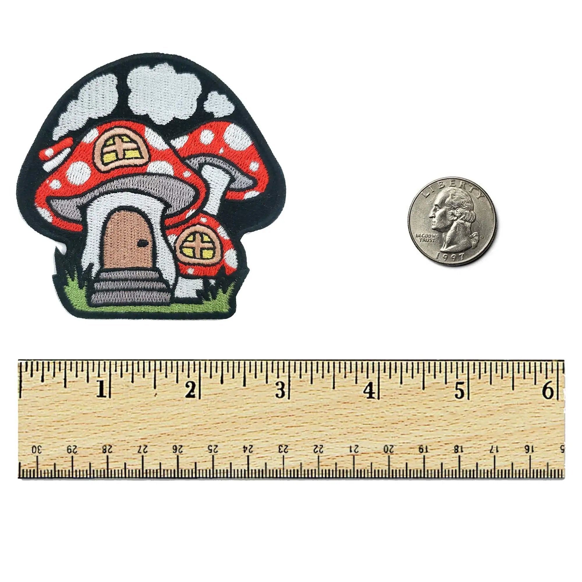 Kolorspun Mushroom House Patch featuring a colorful embroidered mushroom design on fabric for clothing or accessories.