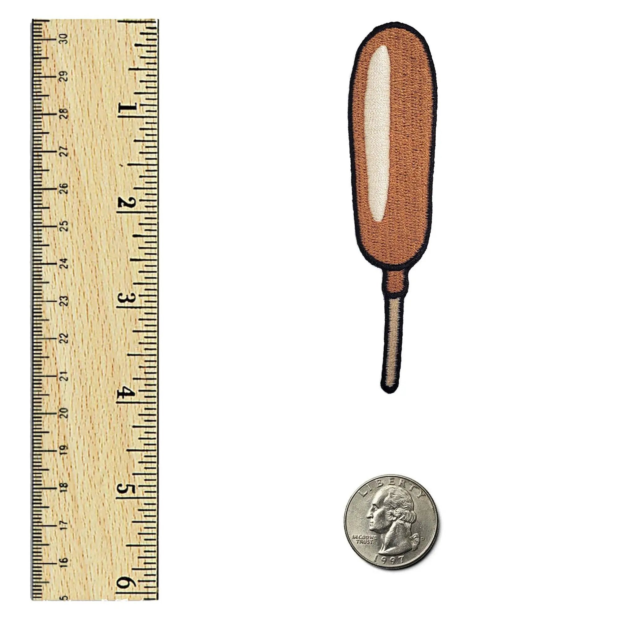 Kolorspun Corn Dog Patch, embroidered patch with a realistic corn dog design on a neutral background.