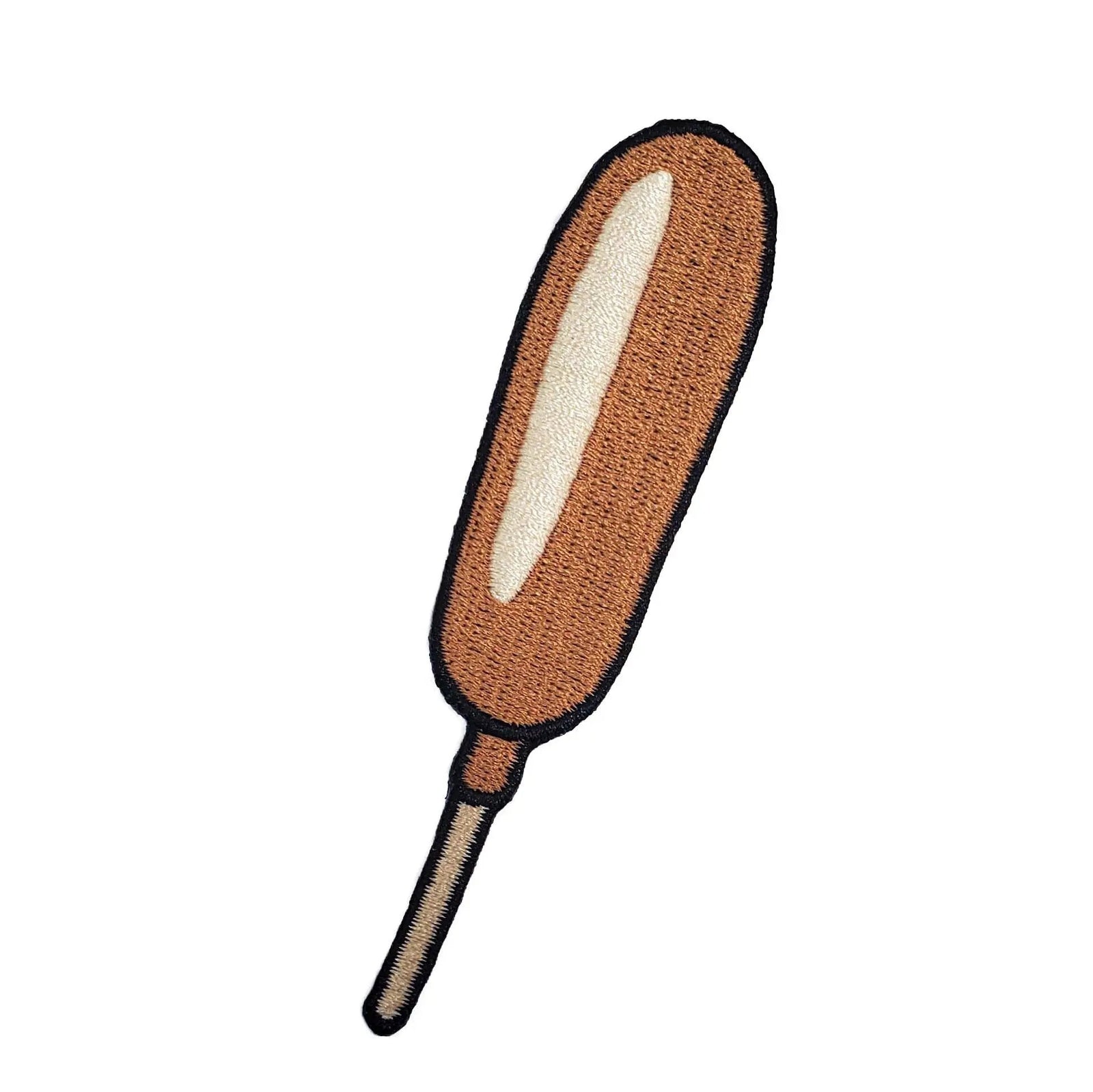 Kolorspun Corn Dog Patch showing a colorful embroidered patch with a corn dog design on a neutral background.