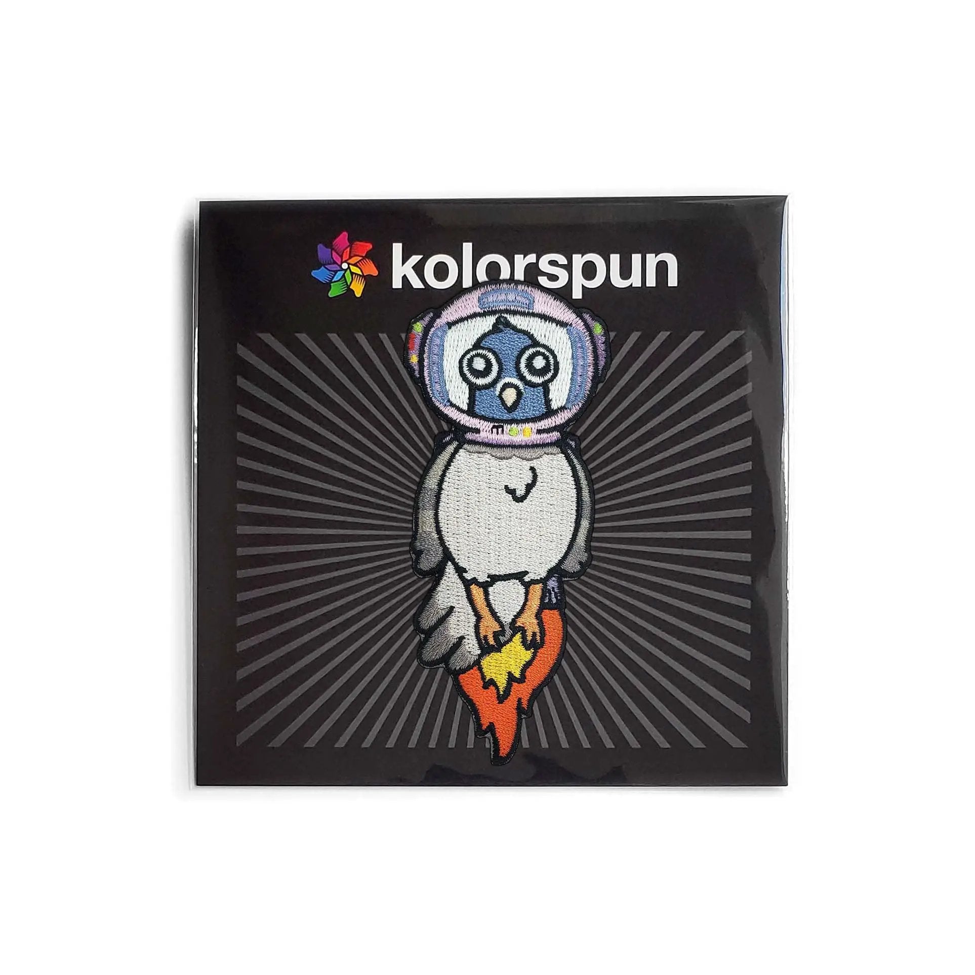 Kolorspun astronaut pigeon patch featuring a detailed embroidered design on a fabric patch for clothing or accessories.