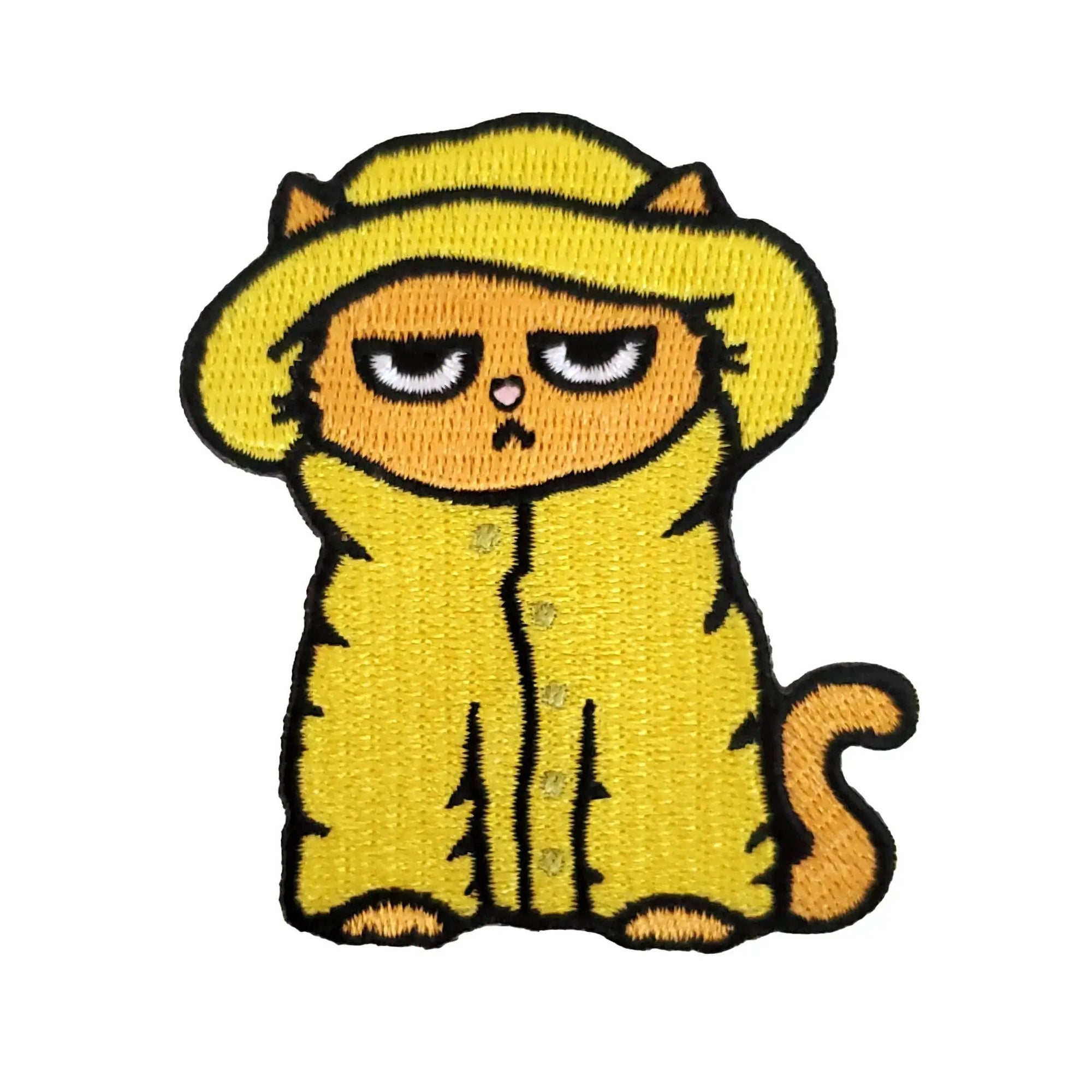Kolorspun Grumpy Raincoat Cat Patch featuring a colorful, embroidered patch with a grumpy cat wearing a raincoat design.
