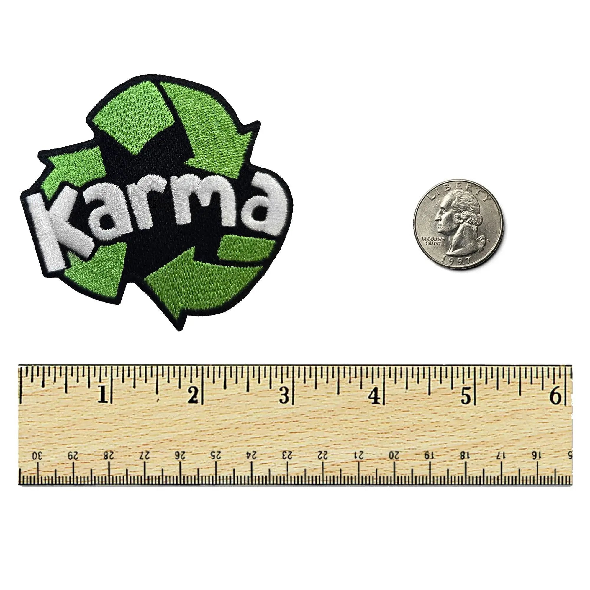 Kolspon Karma Recycling Patch sewn onto fabric, featuring eco-friendly design and vibrant colors for sustainable fashion.