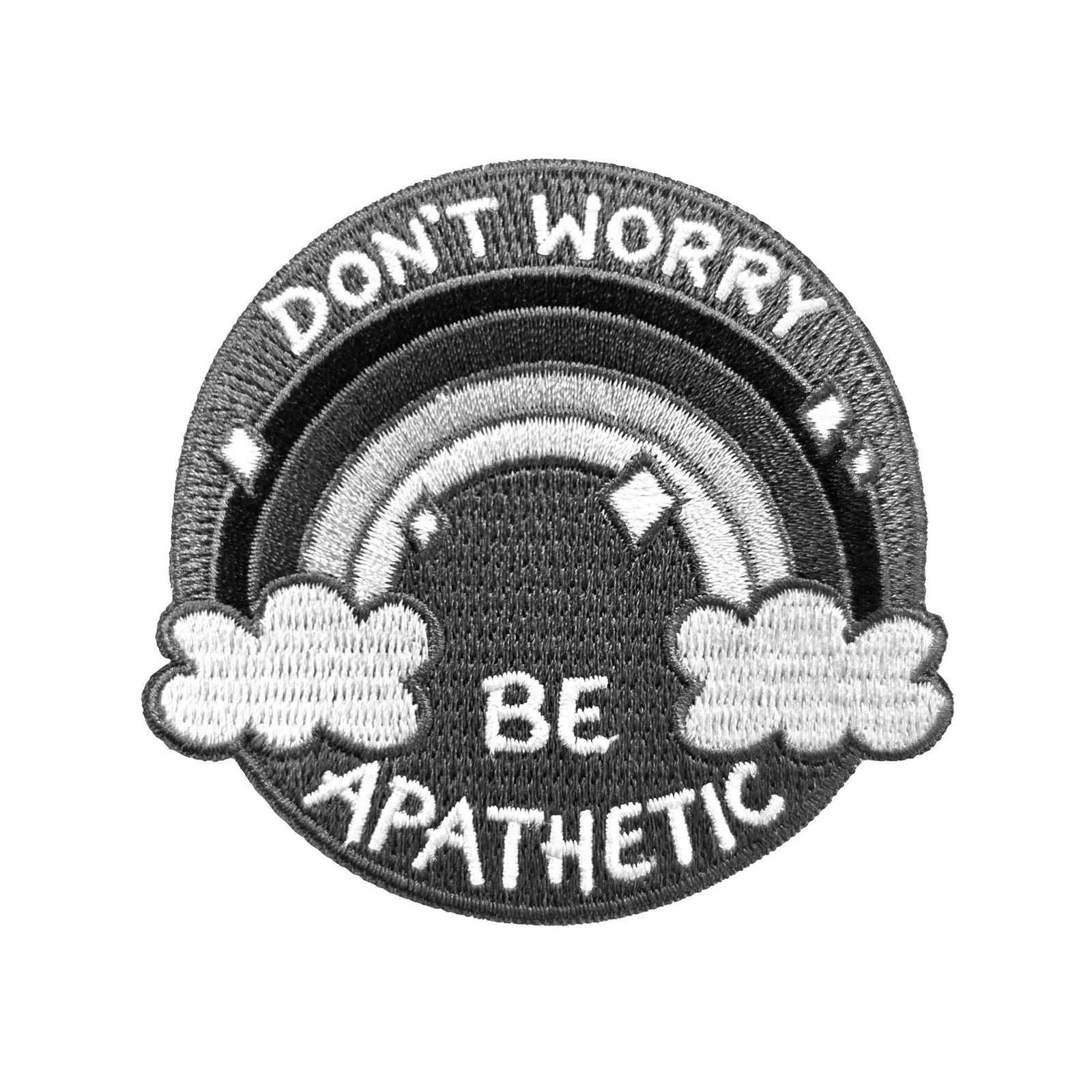 Kolorspun "Don't Worry, Be Apathetic" patch showing a fabric patch with bold text on a neutral background.