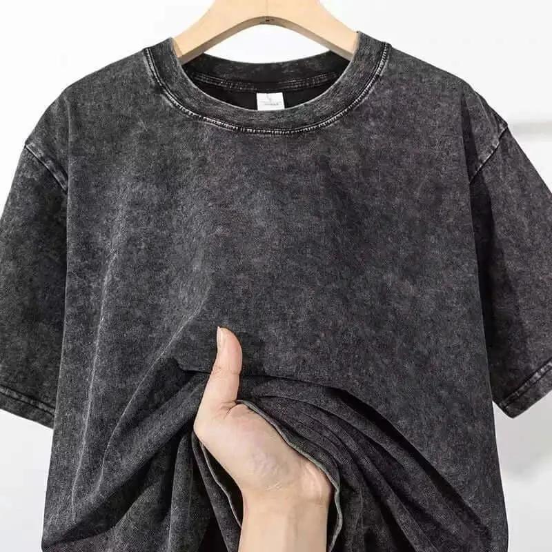Washed black T-shirt featuring Doflamingo from One Piece, vintage streetwear style, by Infinite Visibility.