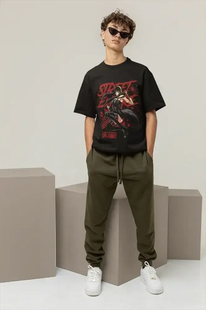 Black Spy x Family T-Shirt featuring Yor, Loid, and Anya in a cute, oversized design from Infinite Visibility.