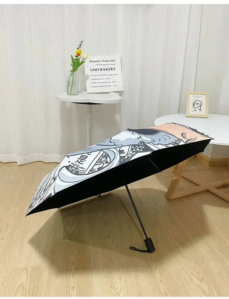 Automatic Nika Luffy One Piece umbrella by Infinite Visibility with foldable design and sun protection, featuring colorful character artwork.