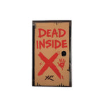 Kolorspun Dead Inside golf ball marker with black and white design, featuring bold "Dead Inside" text, used for marking golf balls on the course.