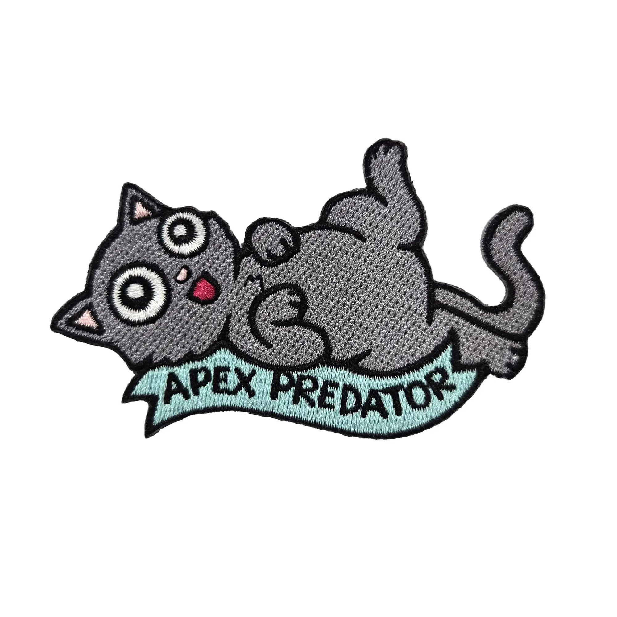Kolorspun Apex Predator patch featuring a detailed, colorful design on fabric for clothing or accessories.