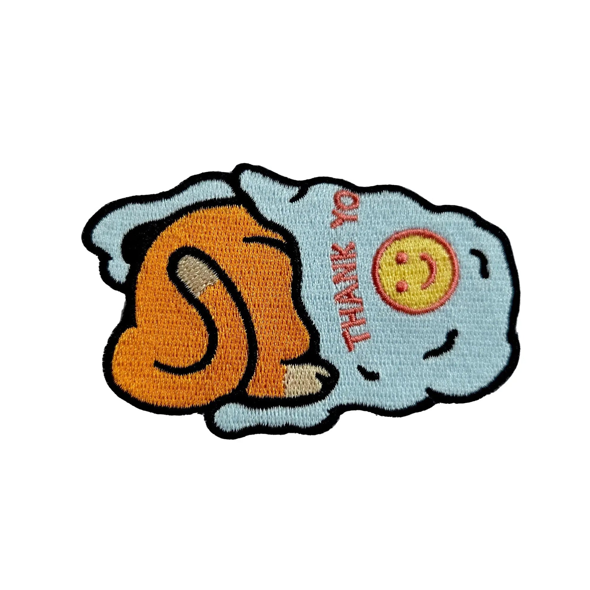 Kolorspun Cat's in the Bag patch featuring a cartoon cat peeking out of a paper bag, ideal for clothing or accessories.
