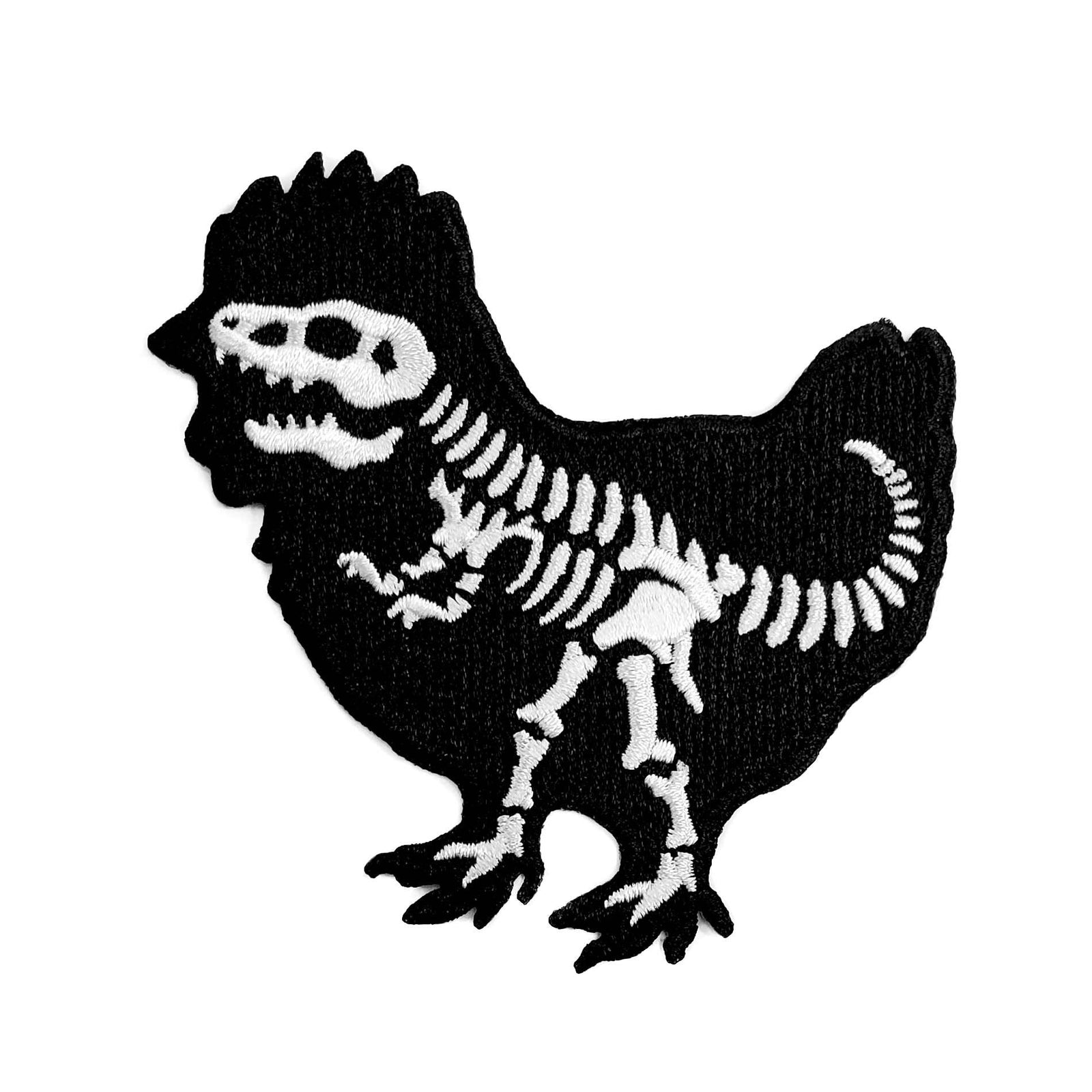 Kolorspun Chicken Dinosaur patch sewn onto fabric, featuring colorful dinosaur design for clothing or accessories.