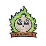Kolorspun Cry About It Onion Patch sewn onto fabric, featuring a colorful cartoon onion with expressive face and playful design.