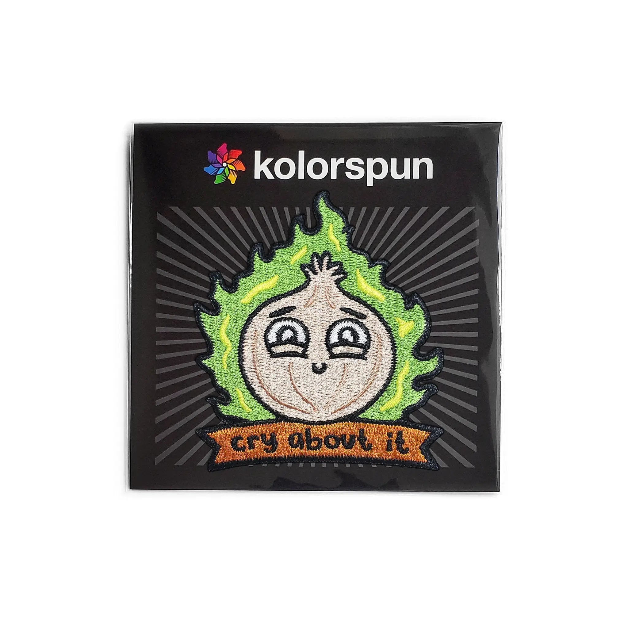 Kolorspun Cry About It Onion Patch sewn onto fabric, featuring a humorous cartoon onion with a sad expression.