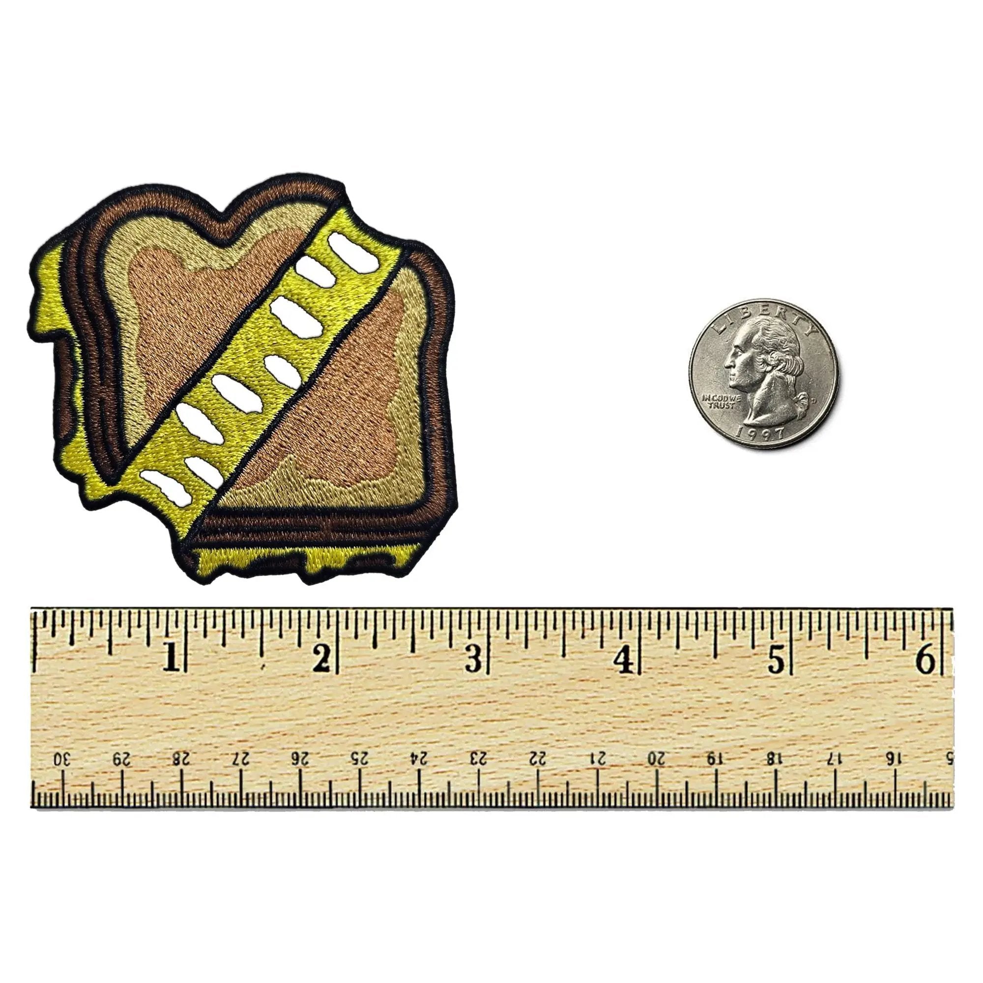 Kolorspun grilled cheese sandwich patch with embroidered cheese and bread details, perfect for clothing or accessories.