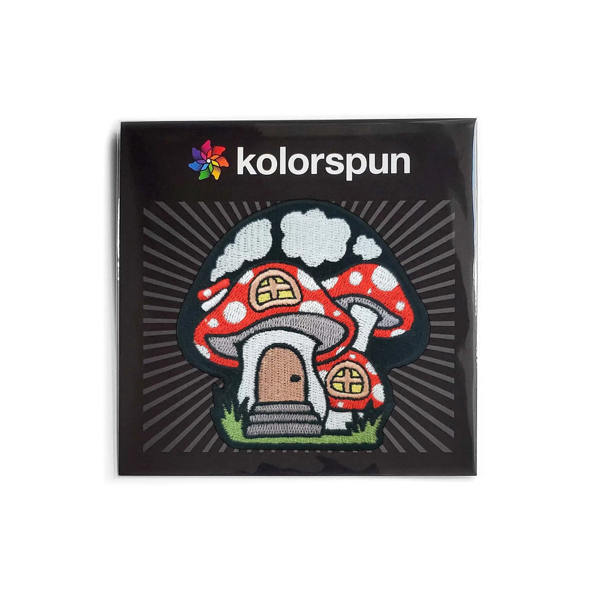 Kolorspun Mushroom House Patch featuring colorful embroidered mushroom design on fabric patch for clothing or crafts.