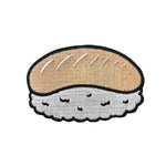 Colorful sushi patch by Kolorspun featuring a detailed design of a sushi piece on fabric.