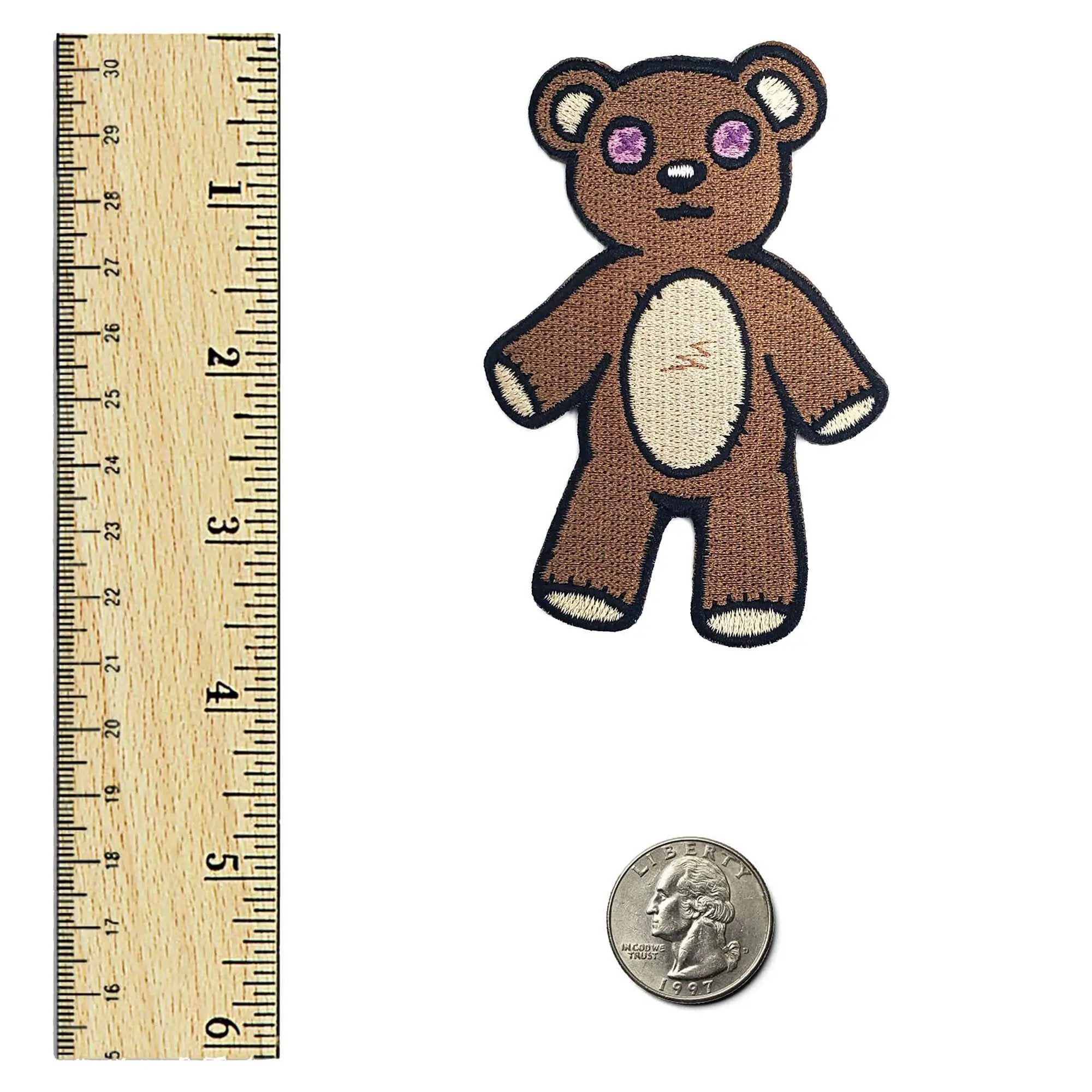 Kolorspun Teddy Bear Patch sewn onto fabric, featuring a cute embroidered bear design for clothing or accessories.