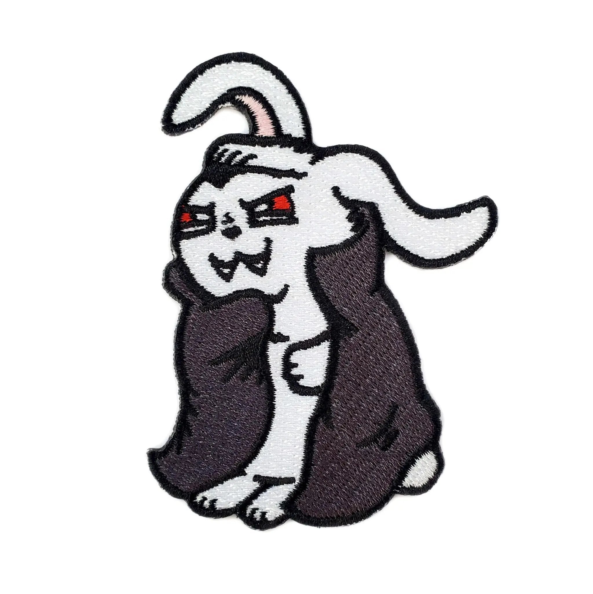 Vampire Bunny patch by Kolorspun featuring a cute bunny with vampire fangs and bat wings on a fabric patch.