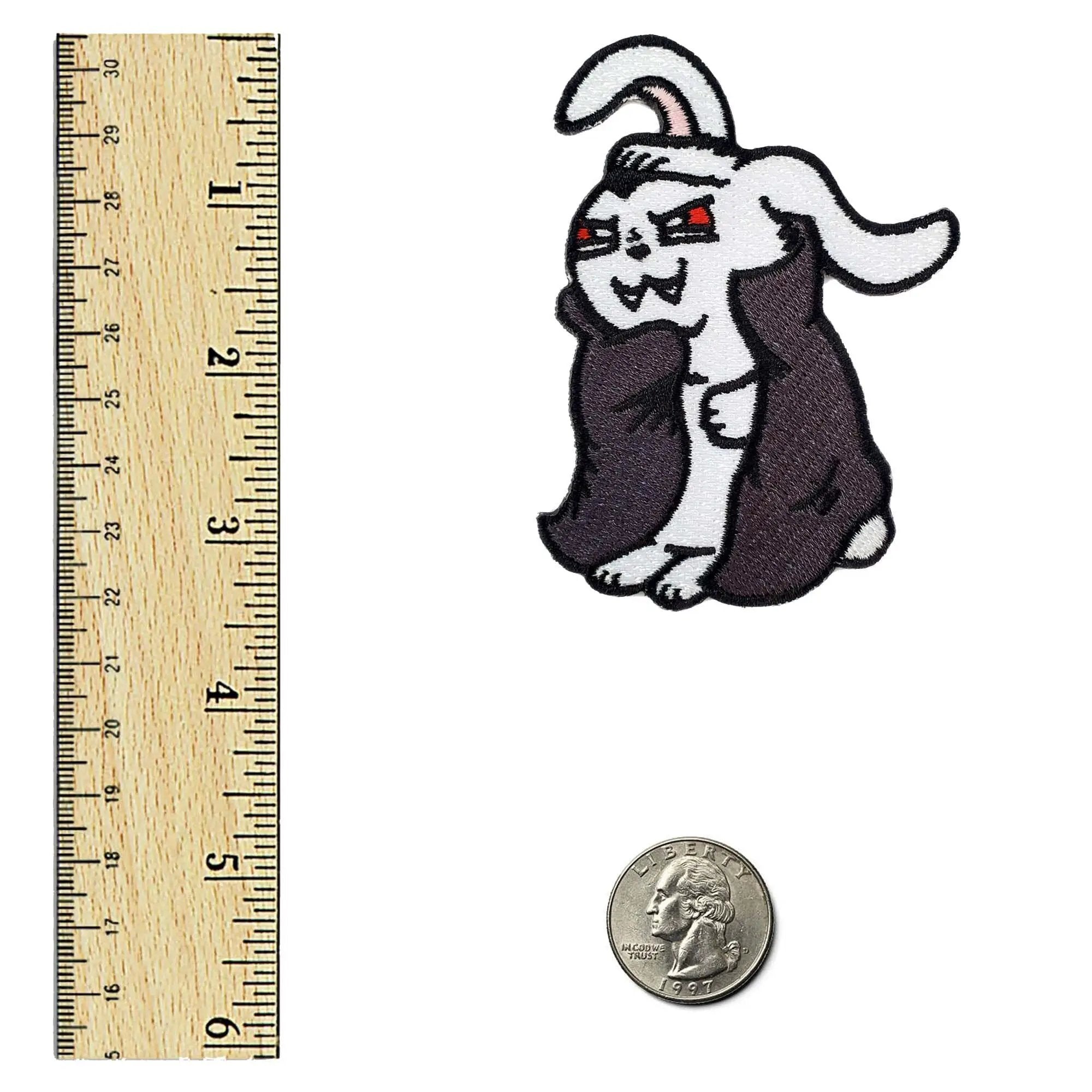 Vampire Bunny Patch by Kolorspun featuring a cute bunny with vampire fangs and bat wings, embroidered on black fabric.