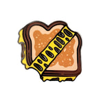 Kolorspun grilled cheese pin featuring a detailed, colorful cheese sandwich design on a metal pin.