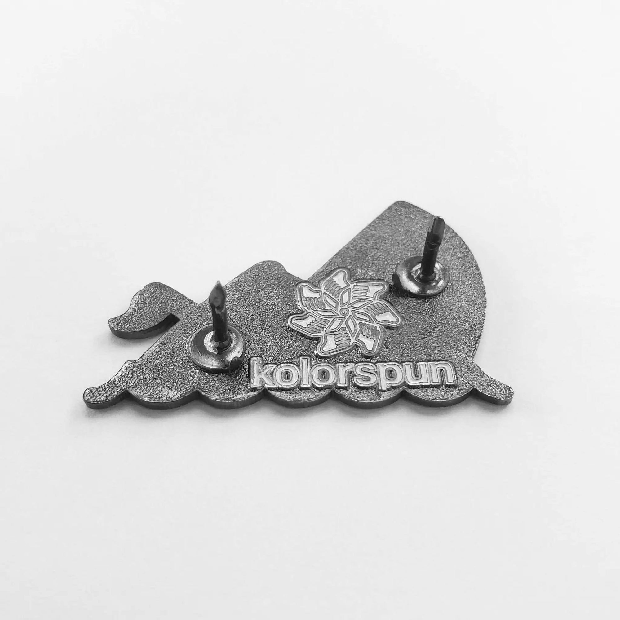 Kolorspun "I'm Fine" boat pin showing a small metal pin with a boat design and "I'm Fine" text on the front.