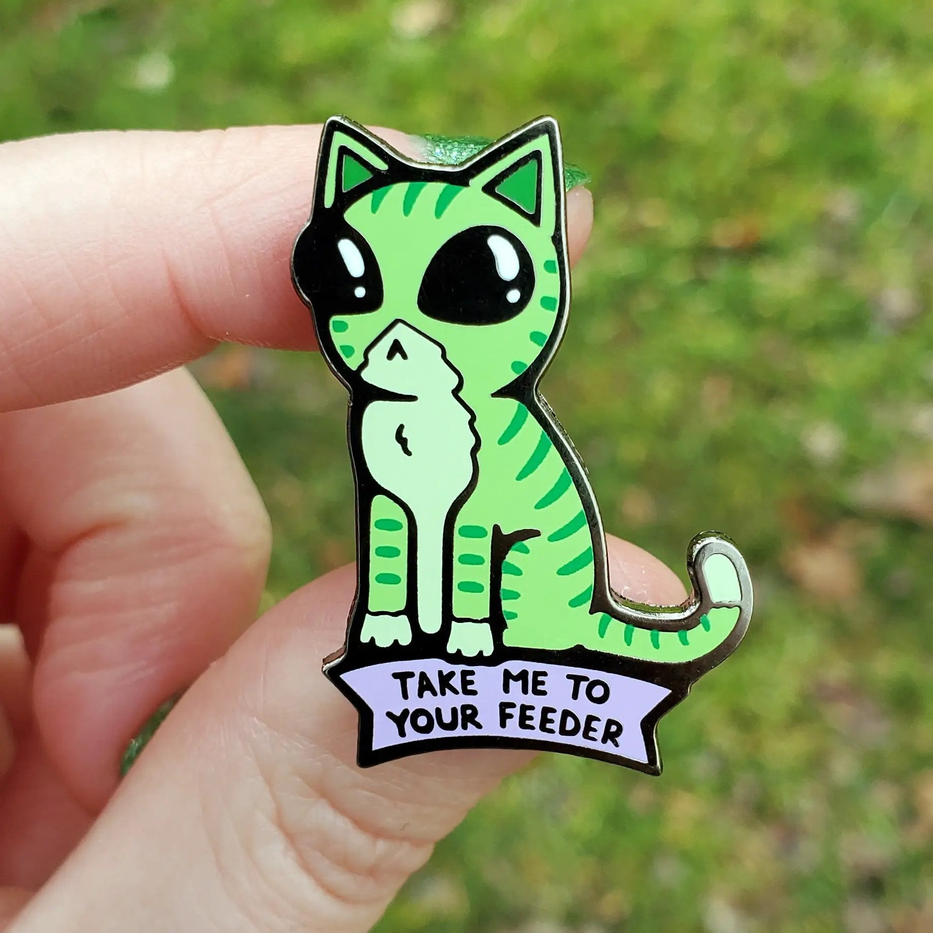 Kolorspun Take Me To Your Feeder cat pin featuring a cute feline design, perfect for cat lovers and pin enthusiasts.
