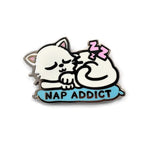 White Nap Addict pin by Kolorspun featuring a bold design, perfect for adding a stylish touch to clothing or accessories.