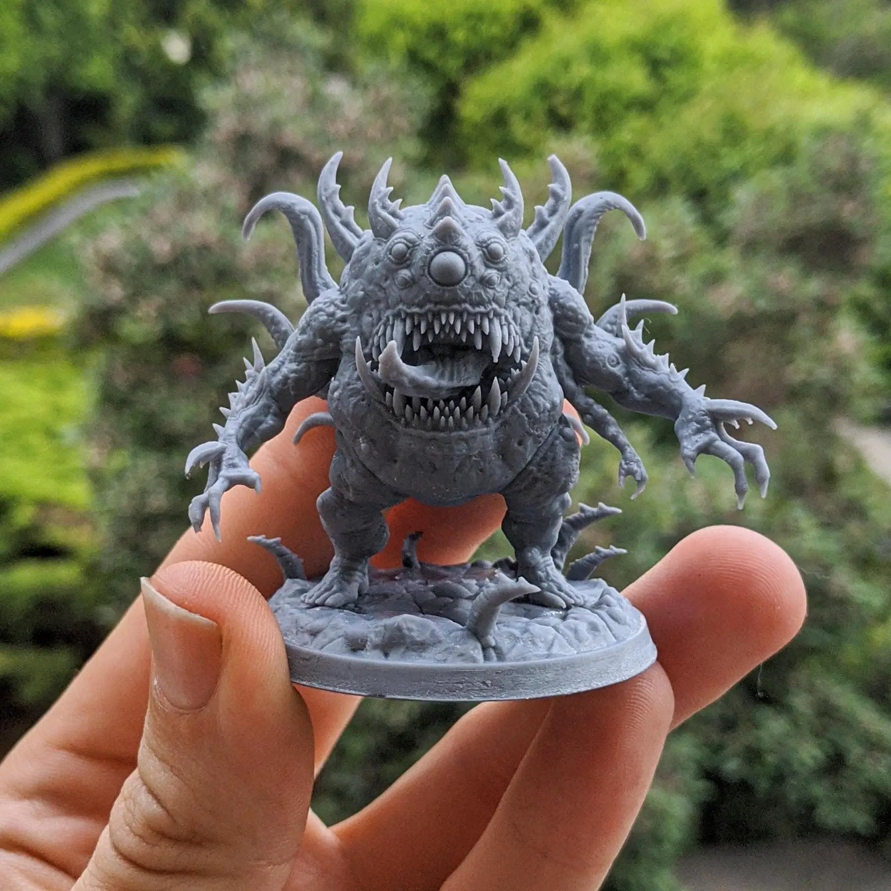 Three 3D printed Abominations miniatures by Dark Gods from Last Hope Miniatures, showing detailed monstrous figures on a display surface.