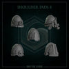 Set of 10 3D printed angel wing shoulder pads by Last Hope Miniatures, detailed white resin accessories for miniatures and models.