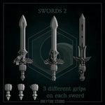 Set of nine 3D printed angel wing swords by Last Hope Miniatures for Greytide Studio, featuring detailed wing and sword designs.