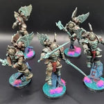 3D printed Crimson Wings Honor Guard Squad model by DakkaDakka Miniatures, detailed miniature with red and gold armor.