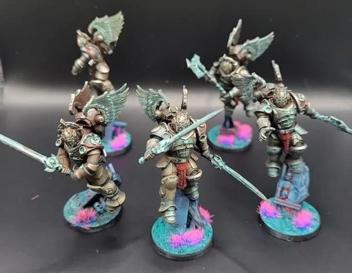 3D printed Crimson Wings Honor Guard Squad model by DakkaDakka Miniatures, detailed miniature with red and gold armor.