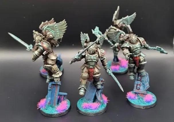 3D printed Crimson Wings Honor Guard Squad model by Last Hope Miniatures, featuring detailed crimson armor and winged figures.