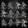 3D printed Heavy Sisters Squad model by DakkaDakka Miniatures, featuring detailed armored figures in a dynamic pose.