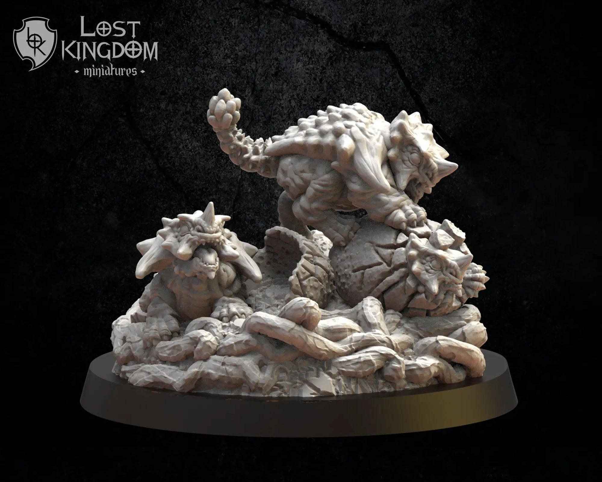 3D printed Colohti with babies miniature model by Lost Kingdom Miniatures, showing detailed figures on a textured base.