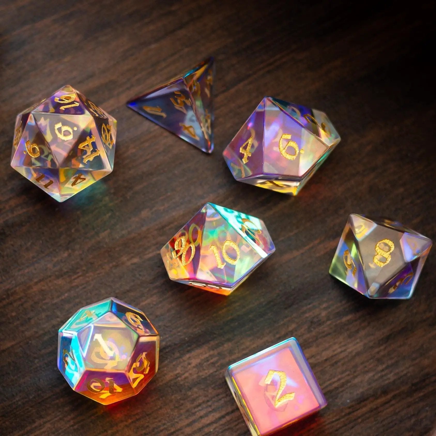 Hand-carved gemstone dichroic glass DND dice set by Runic Dice, featuring vibrant, colorful gemstone dice for tabletop gaming.