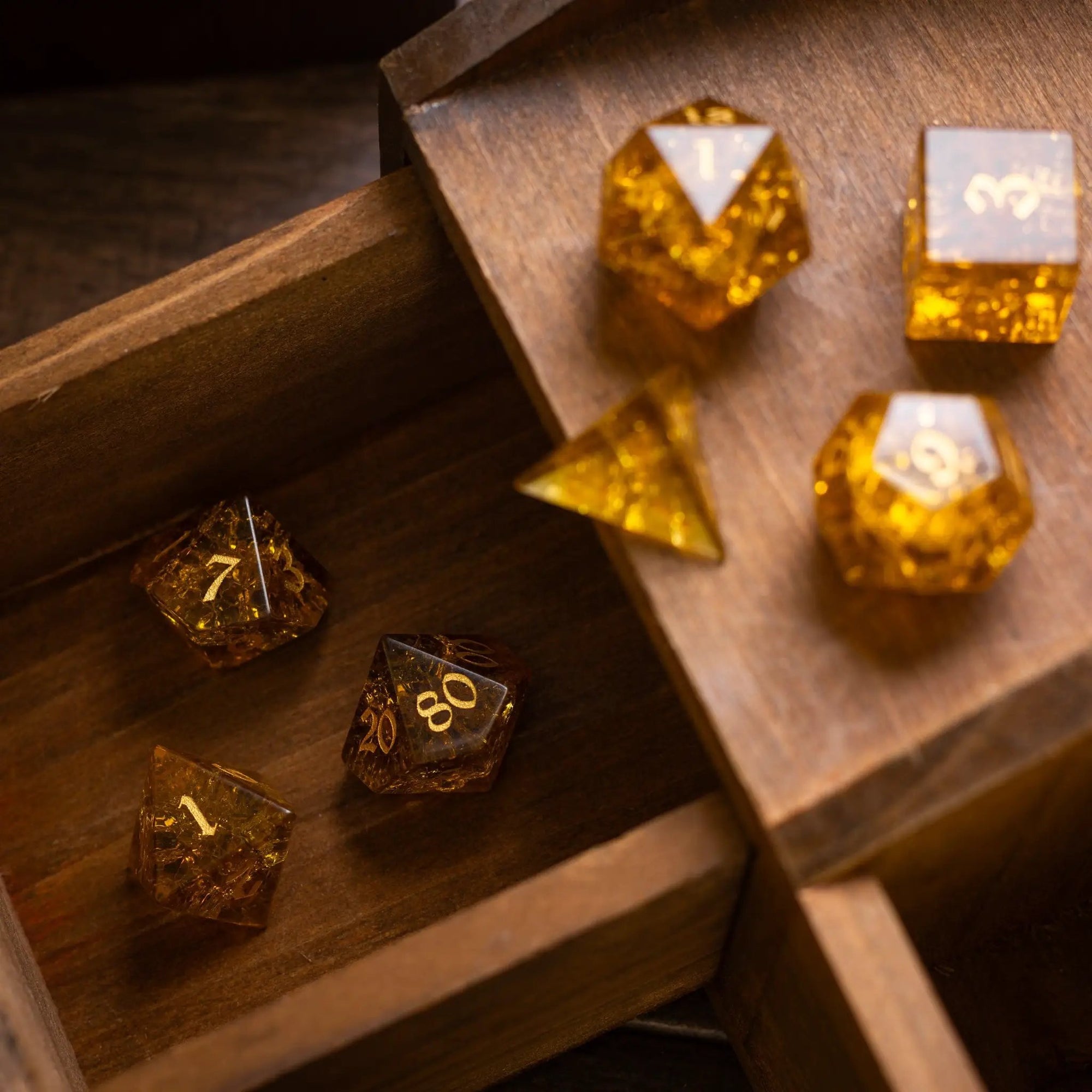Runic Dice gold honey lightning cracked glass gemstone DND dice set with intricate crack pattern and shimmering finish.