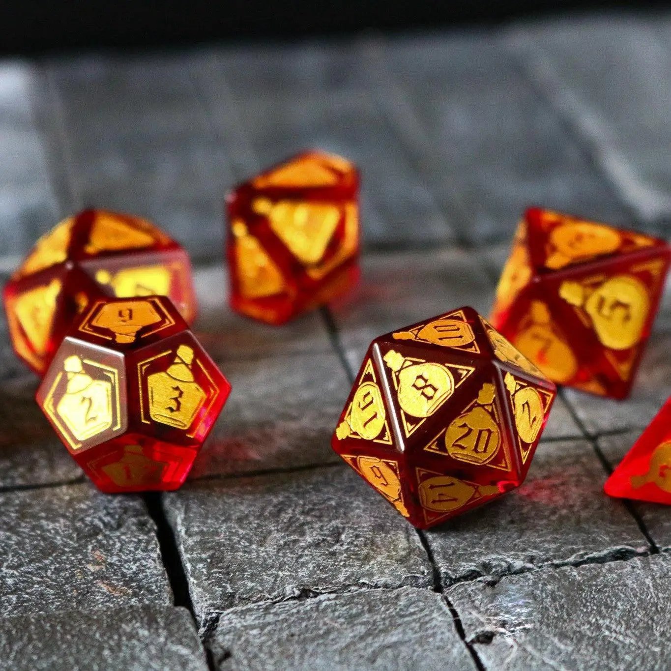 Red Zircon gemstone D&D dice set by Runic Dice featuring health potion-inspired glass dice with vibrant red color.