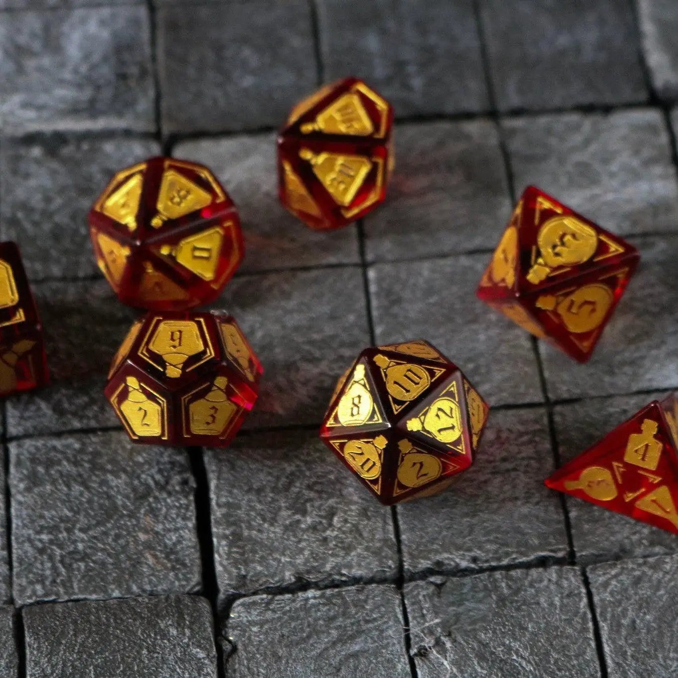 Red zircon gemstone DND dice set by Runic Dice featuring health potion design, glass material, and seven-sided polyhedral dice.