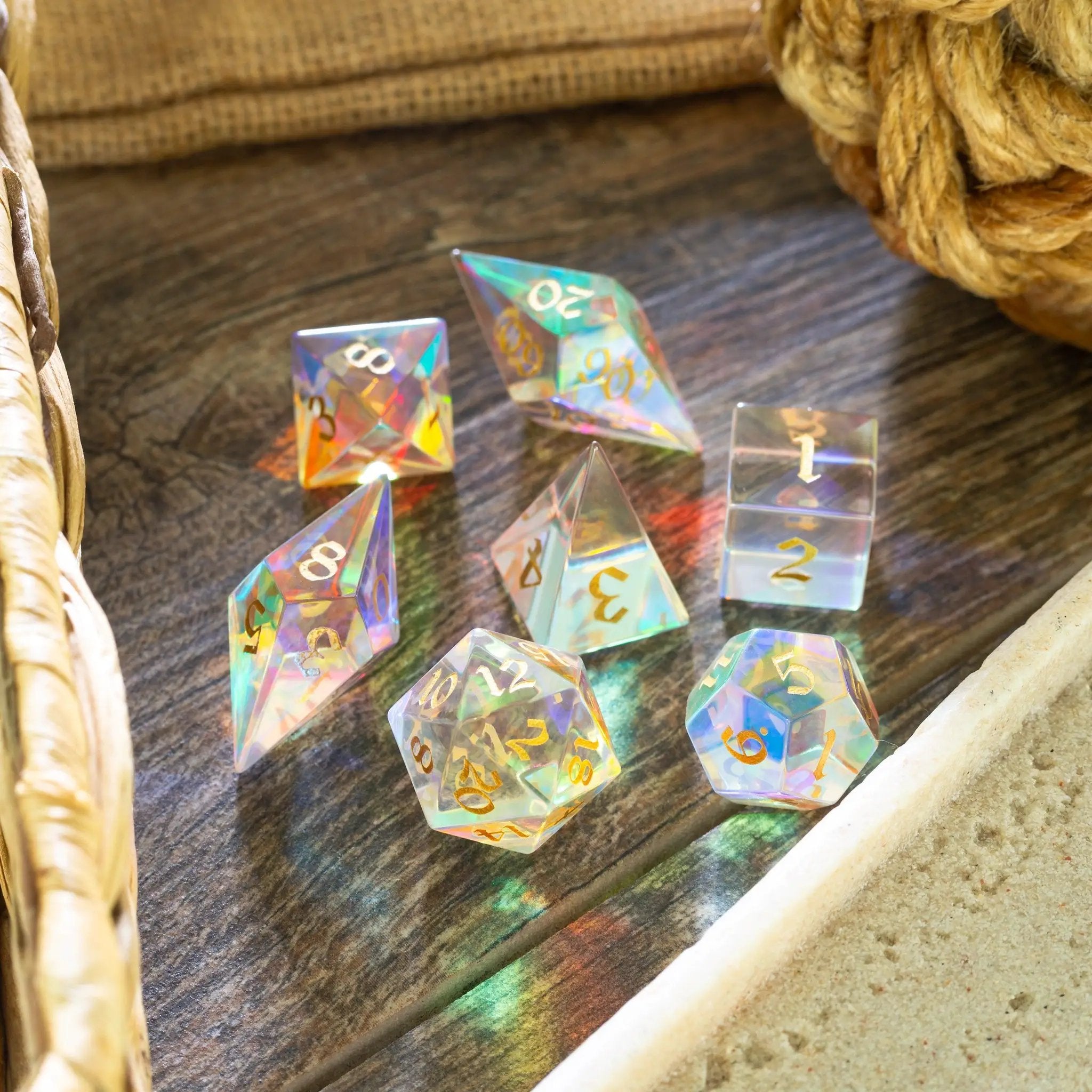 Set of gemstone dichroic glass Elven cut DND dice from Runic Dice featuring vibrant, colorful, and intricate designs.