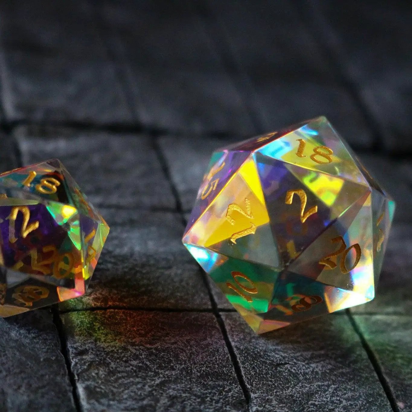 Large dragon egg dichroic glass D20 gemstone polyhedral dice by Runic Dice, featuring vibrant colors and intricate patterns.