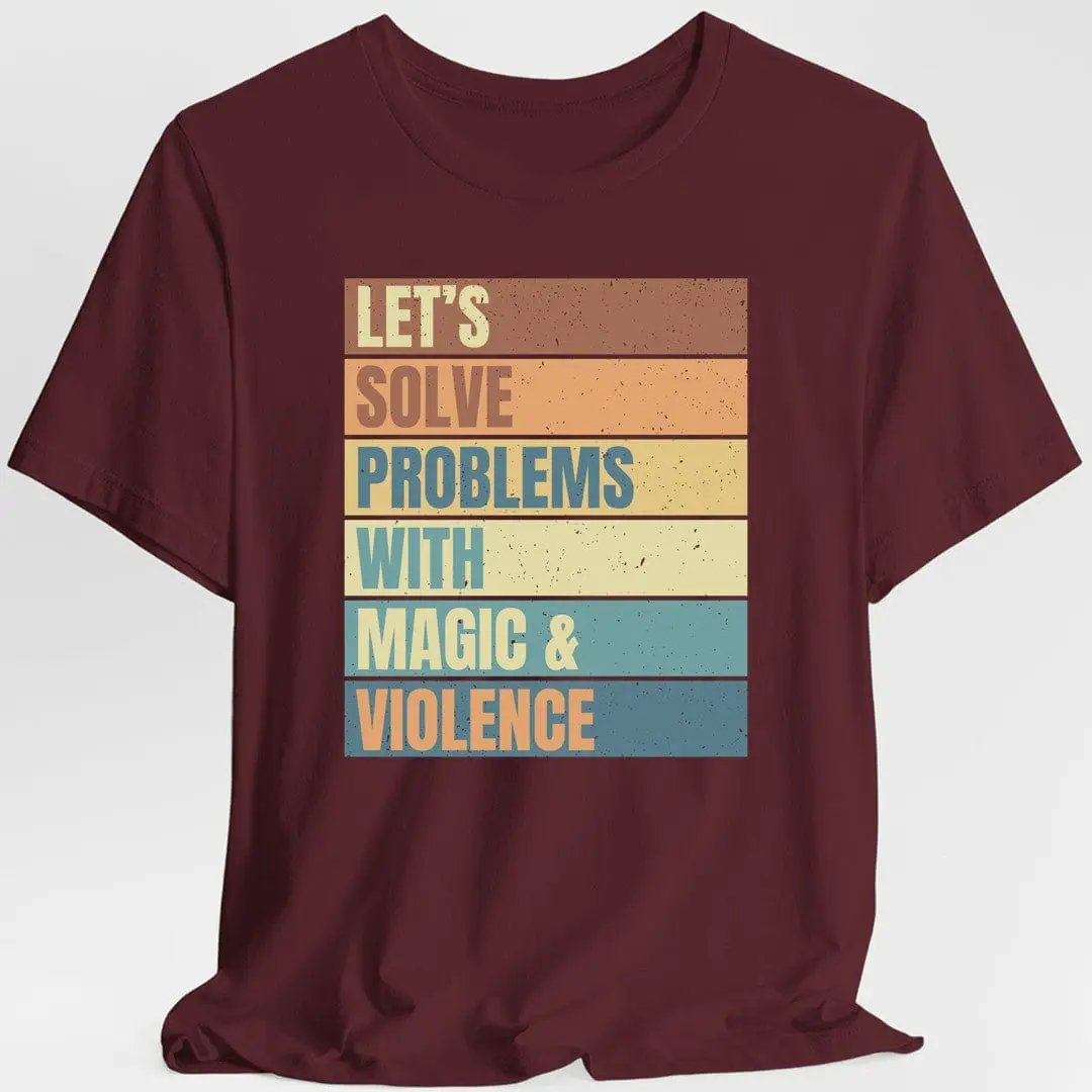 Maroon Sunburst RPG T-shirt featuring a retro design with the phrase "Let's Solve Problems With Magic & Violence."