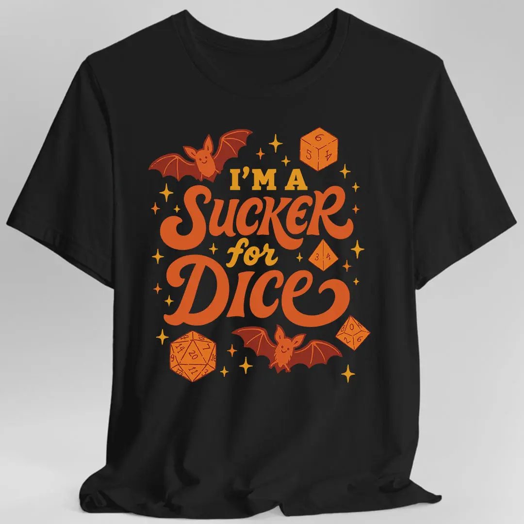 Black Sunburst RPG T-Shirt featuring a cute Halloween-themed design with dice and the phrase "I'm a Sucker for Dice" on the front.